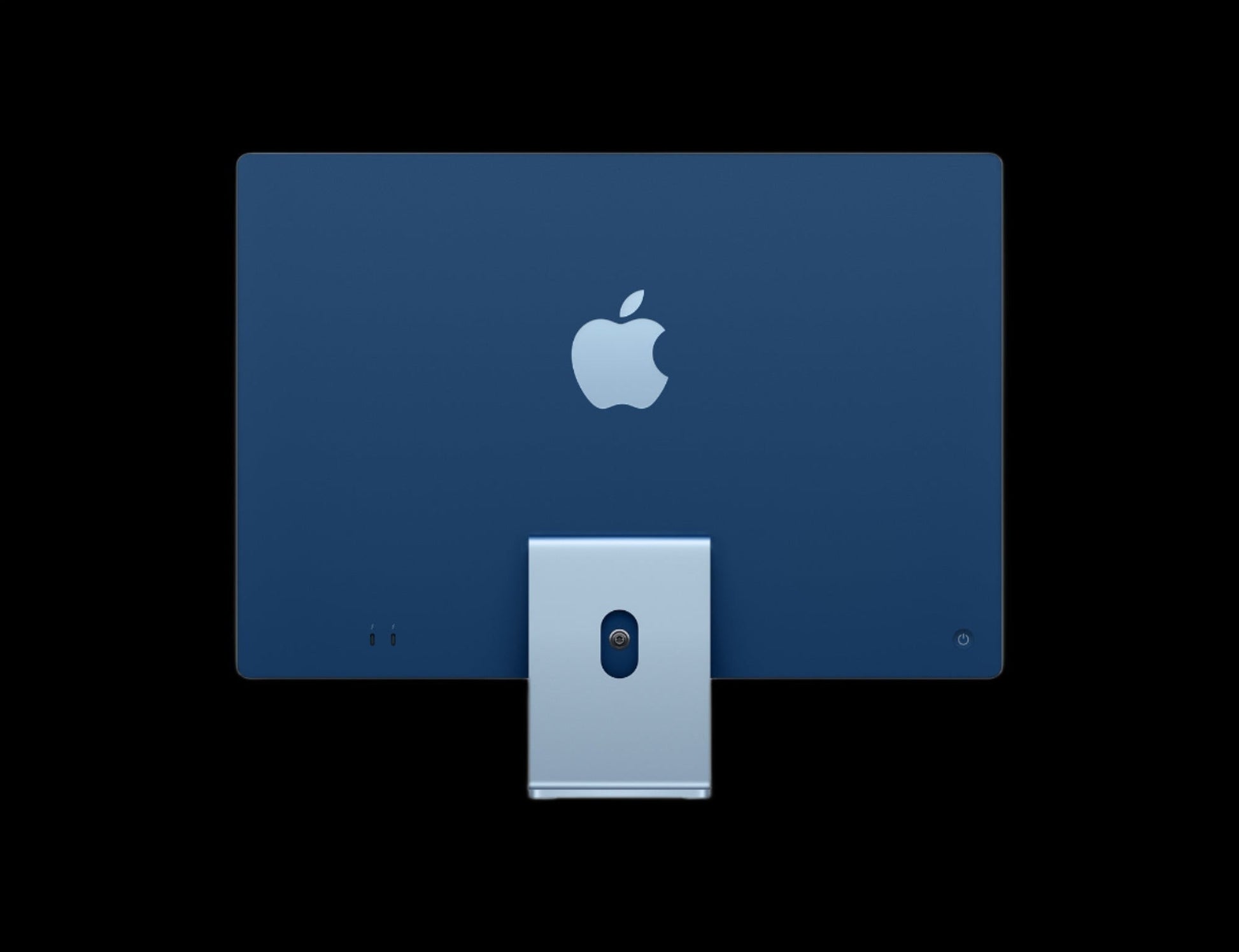 "Image of the 24-inch Apple iMac, showcasing its sleek and modern design. The all-in-one desktop is displayed at an angle, highlighting its thin profile, vibrant display, and minimalist aesthetic. The iconic Apple logo is prominently featured on the back of the device."